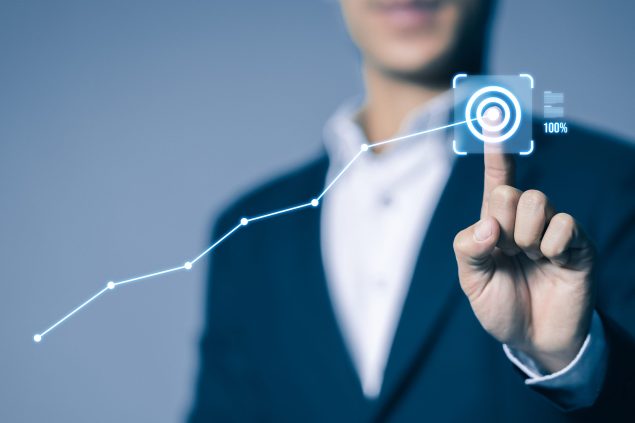Businessman pointing graph of business target on virtual screen, Business development to success growing growth, Business goals and planning concept